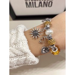 Bratara argintie cu margele si diverse accesorii deosebite galbene