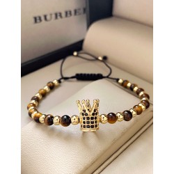 Bratara dama model deosebit cu piatra semipretioasa Ochi de tigru si design special coroana
