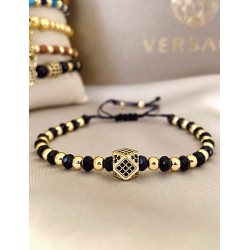 Bratara dama model deosebit cu margele negre si aurii si hexagon