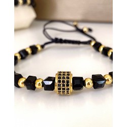 Bratara dama model deosebit cu margele aurii si negre si design cerc